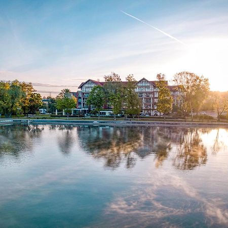Willa Port Ostroda Ngoại thất bức ảnh The lake at the campus of the University of Applied Sciences and Medical University of Southern Tyrol